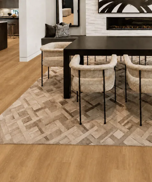 Spanish Cedar - 13/32&Quot; (10.5Mm) - Design Cork Floating (Fsc10.5) Spanish Cedar Natural Wood-Grain Cork Flooring In An Open-Plan Dining Room With A Modern Fireplace.