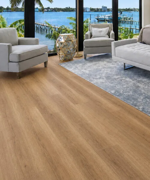 Spanish Cedar - 13/32&Quot; (10.5Mm) - Design Cork Floating (Fsc10.5) Spanish Cedar Natural Wood-Look Cork Flooring In A Waterfront Living Room With Floor-To-Ceiling Windows.