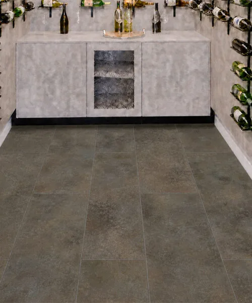 Sunlit Stone - 19/64&Quot; (7.5Mm) - Swiss Techslate (Msunst7.5) Sunlit Stone Dark Taupe Swiss Techslate Flooring Installed In A Contemporary Wine Cellar.
