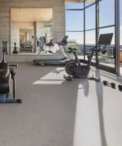 Modular - 7/16&Quot; (11Mm) - Swiss Real Cork Floating (Fmod11) Bright Home Fitness Room With Cork Flooring In Light Gray, Gym Equipment, And Panoramic City View