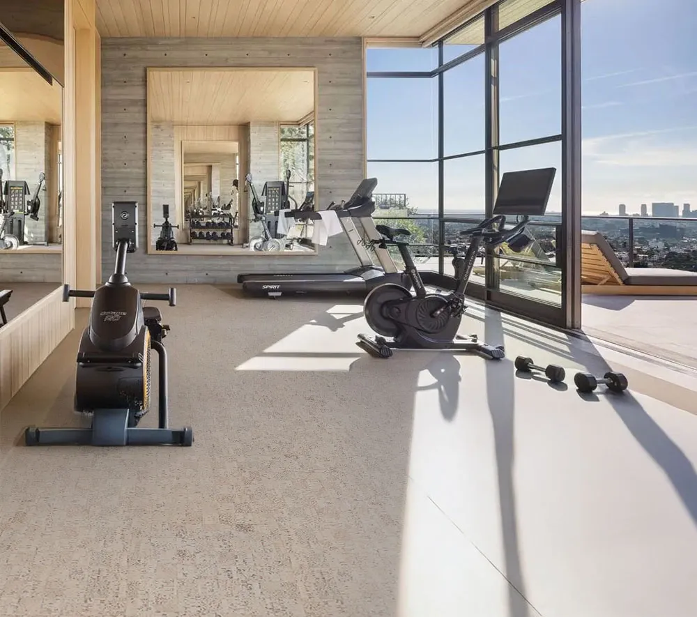 Modular - 7/16&Quot; (11Mm) - Swiss Real Cork Floating (Fmod11) Bright Home Fitness Room With Cork Flooring In Light Gray, Gym Equipment, And Panoramic City View