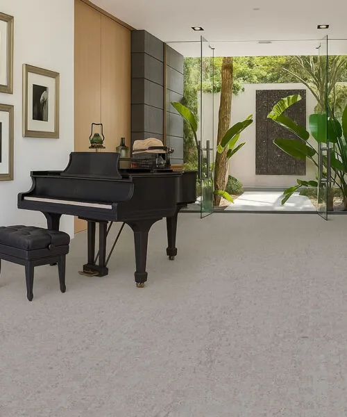 Modular - 7/16&Quot; (11Mm) - Swiss Real Cork Floating (Fmod11) Modern Living Area With Grand Piano And Light Gray Cork Flooring, Blending Indoor And Outdoor Spaces