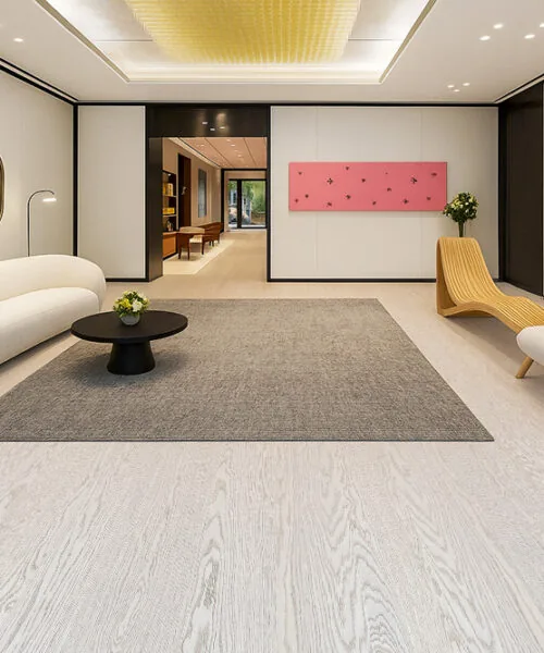 Modern Lounge Interior With Swiss Snow Cap Real Wood Floating Flooring, Showcasing Minimalist Furniture, Soft Neutral Tones, And Contemporary Wall Art.