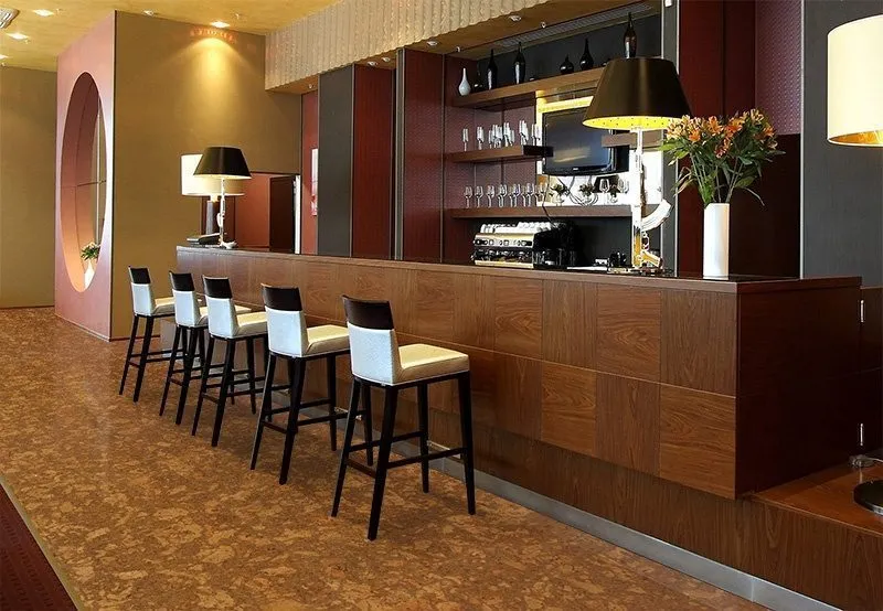 Tasmanian Burl cork glue-down flooring installed as a resilient, low-slip floor in a wine bar and restaurant