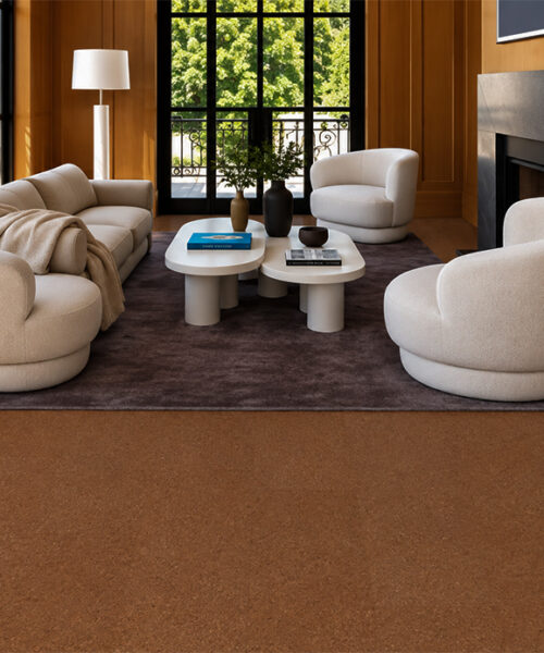Venetian - 25/64&Quot; (10Mm) - Cork Floating (Fven10) Venetian 10Mm Reddish-Brown Cork Floor Planks Frame Cream Seating And A Fireplace In A Paneled Living Room.