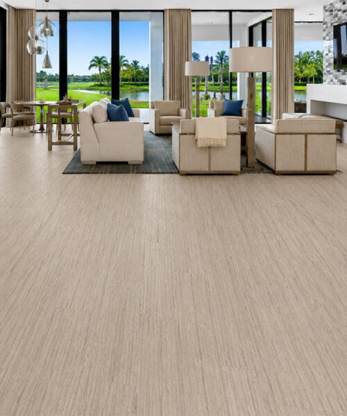 Light beige Swiss cork flooring in a spacious modern living room with lake views