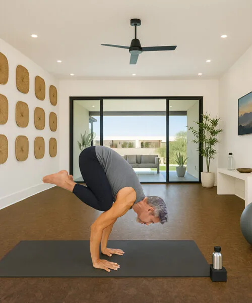 Walnut Burlwood Cork Floor In A Bright Home Yoga Studio With Large Windows And Fitness Equipment.