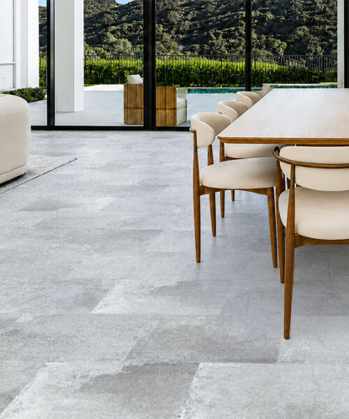 Warm Stone - 7/16&Quot; (11Mm) - Swiss Design Cork Floating (Fwmst11) Light Gray Warm Stone Swiss Design Cork Floating Flooring Spans An Open Dining Room With Pool Views.