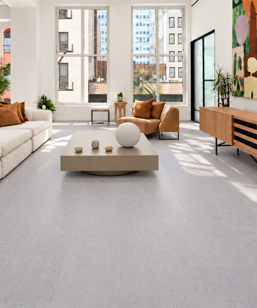 White Bamboo - 1/4&Quot; (6Mm) - Cork Glue Down Tile (Gwb6) White Bamboo Pale White Cork Flooring With Linear Grain Brightens A City-View Living Room With Colorful Art.