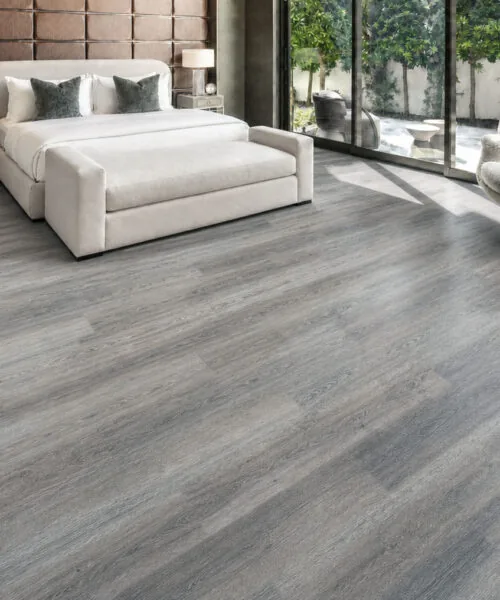 Wild Oak - 13/32&Quot; (10.5Mm) - Design Cork Floating (Fwo10.5) Wild Oak Gray Wood-Look Cork Flooring In A Modern Bedroom With Garden-Facing Windows