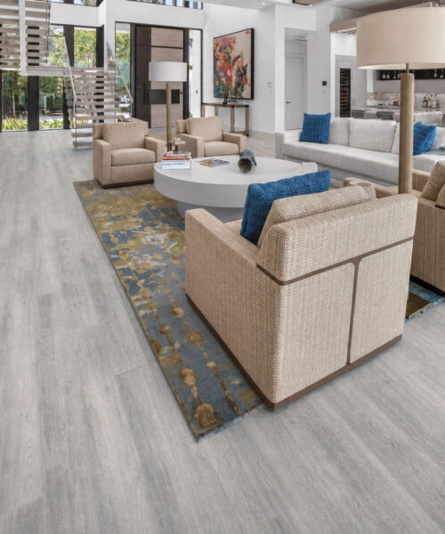 Wild Oak - 13/32&Quot; (10.5Mm) - Design Cork Floating (Fwo10.5) Wild Oak Light-Gray Cork Flooring In An Open-Concept Living Room With A Floating Staircase.
