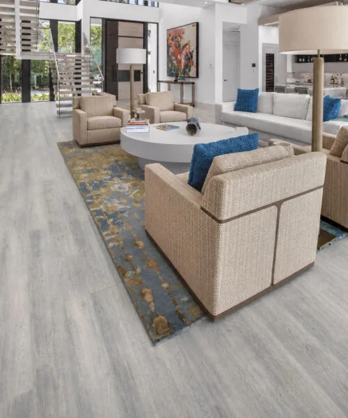 Wild Oak - 13/32&Quot; (10.5Mm) - Design Cork Floating (Fwo10.5) Wild Oak Light-Gray Cork Flooring In An Open-Concept Living Room With A Floating Staircase.