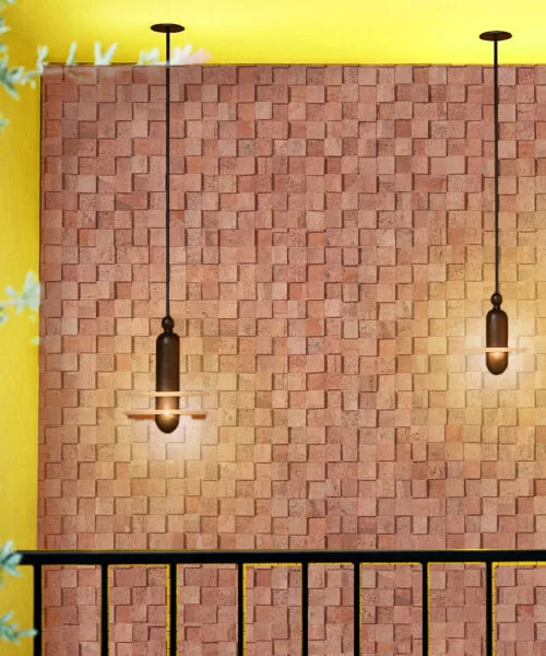 Wood Cubes - 25/64&Quot; (10Mm) - Cork Wall Tiles (Wwocu10) Wood Curb Cork Wall Tiles Installed On A Warm-Toned Wall, Highlighted By Pendant Lighting To Emphasize The 3D Acoustic And Sound-Absorbing Properties Of Natural Cork Panels.
