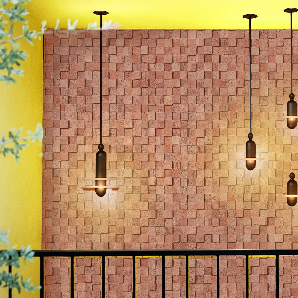 Wood Curb Cork Wall Tiles Installed On A Warm-Toned Wall, Highlighted By Pendant Lighting To Emphasize The 3D Acoustic And Sound-Absorbing Properties Of Natural Cork Panels.