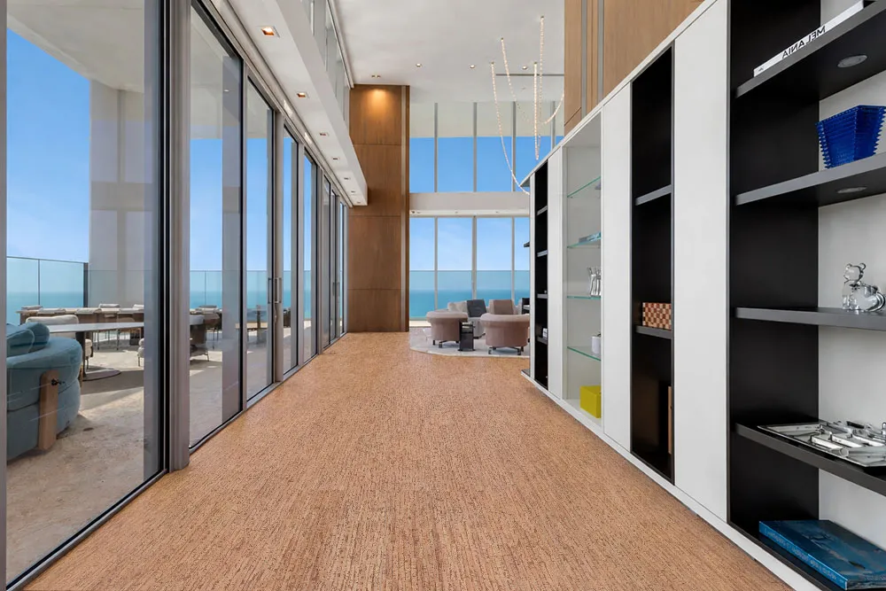Woodflow - 1/2&Quot; (12Mm) - Cork Floating (Fwof12) Modern Corridor Featuring Woodflow Cork Flooring With Floor-To-Ceiling Glass And Natural Light